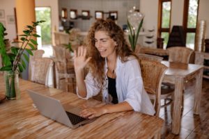 woman online conferencing from home